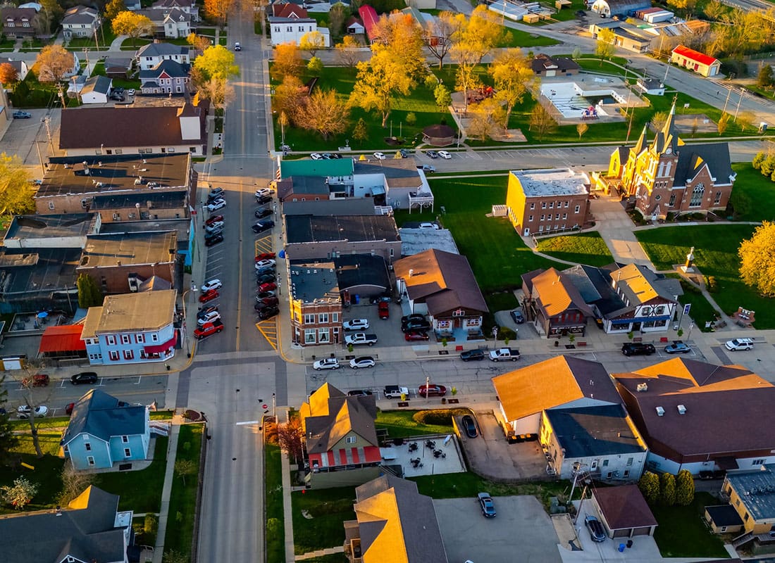 Ellsworth, WI - Aerial view of a small town in Wisconsin with businesses and trees in view